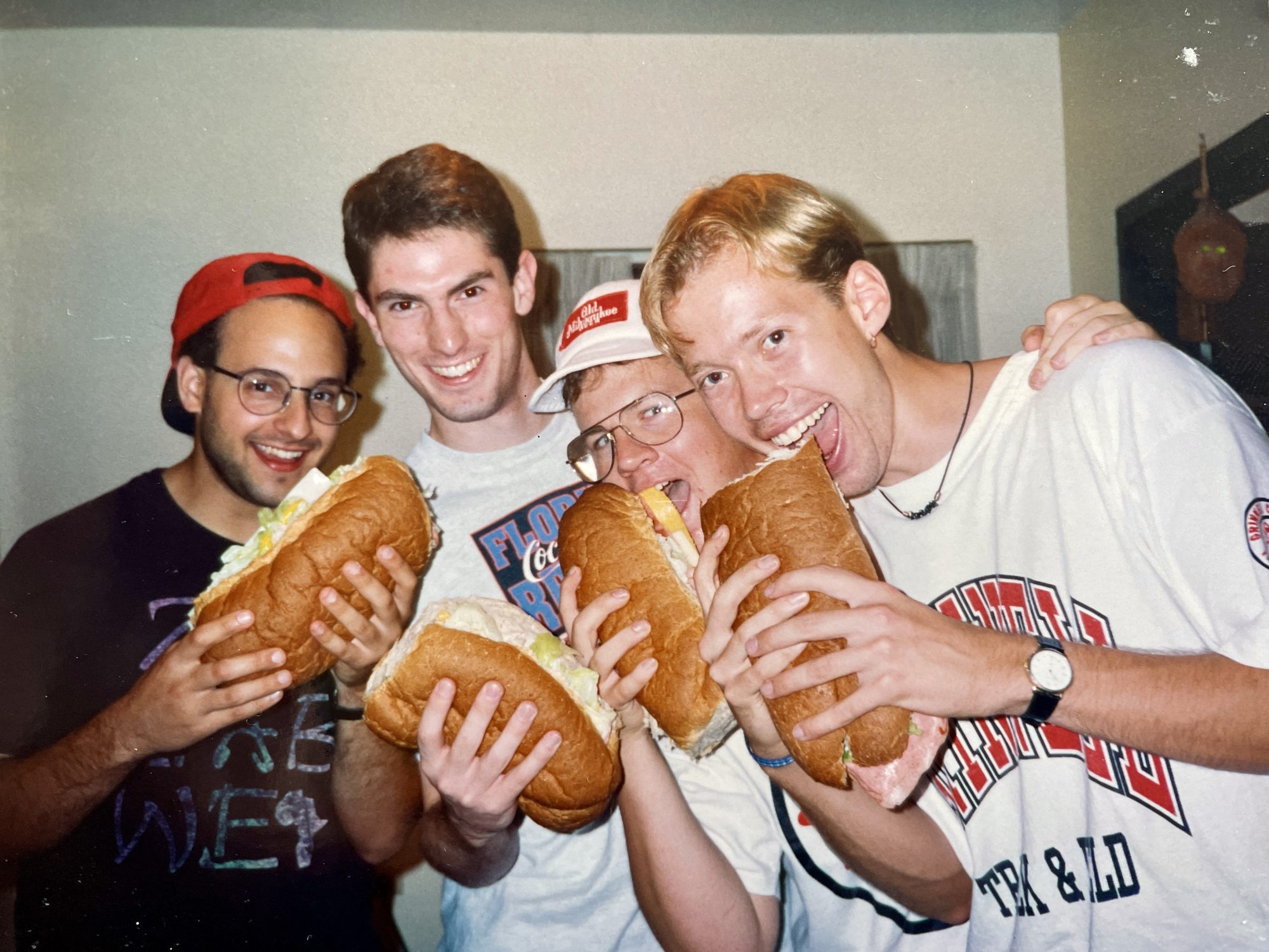 BSN Founding Fathers: Seth "Captain" Bernsen, Brent "Glenda the Good ‘Wich" Dexter, Karl "BF Good ‘Wich" Johnson, and Zack "‘Wich Doctor" Steven in the Cowles Hall dorm room where the tradition began